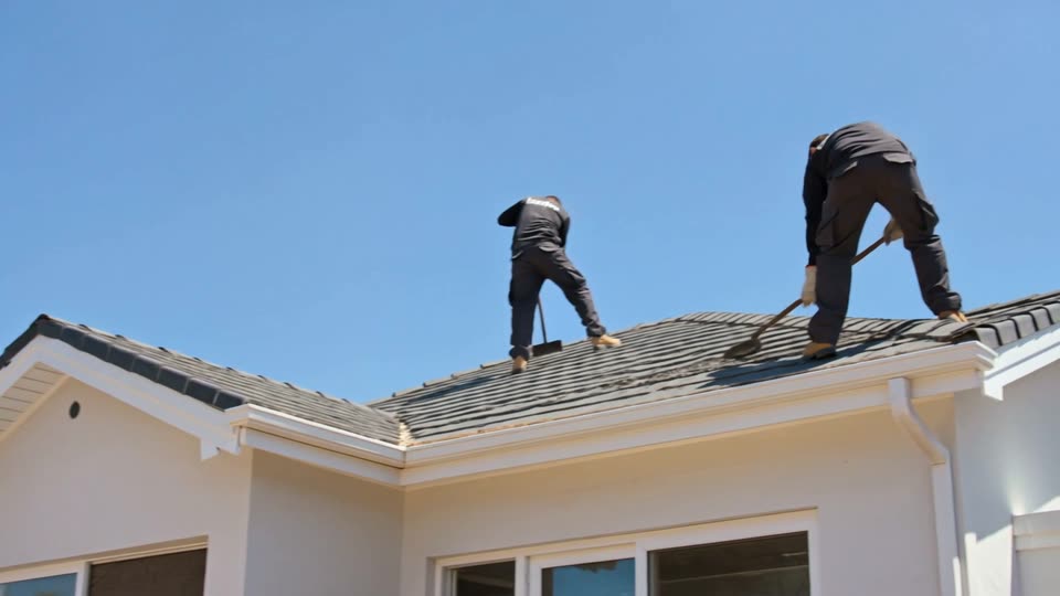 Asbestos Removal Johannesburg - contractors stripping asbestos cement roof sheets from a house roof